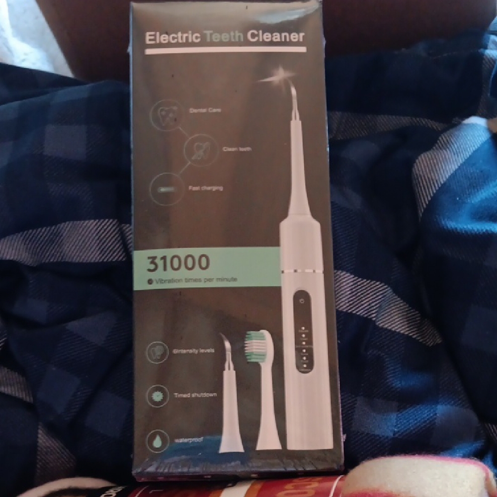 Electric Teeth Cleaner - White